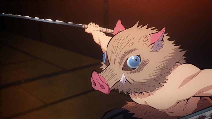 Inosuke Hashibira charging forward in his boar mask with a serrated Nichirin sword